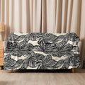 Plush Zebra Leaf Sherpa Blanket in black and white, showcasing a unique monochrome leaf design, perfect for fall and winter coziness.