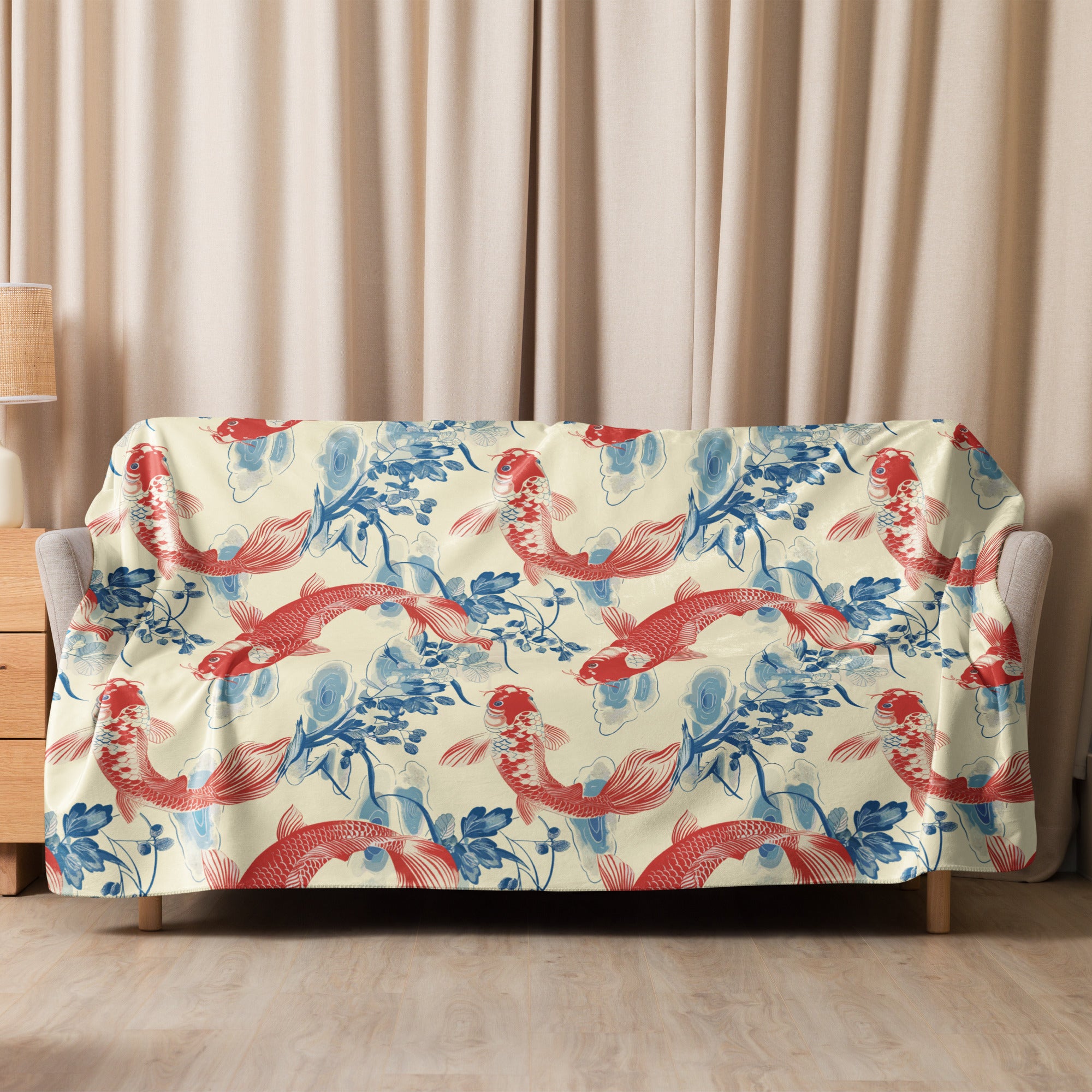 Sherpa blanket with red koi fish and blue floral design on cream background, creating a cozy and stylish aesthetic for holiday and winter use.