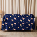 Navy sherpa blanket with a cosmic planetary design, featuring Saturn and celestial stars, ideal for autumn and winter coziness.