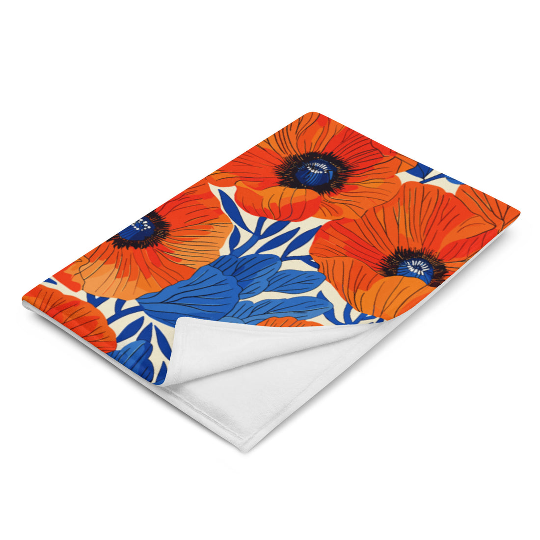 Vibrant orange poppy floral silk touch throw blanket with contrasting blue backdrop, perfect for cozy fall and winter evenings.